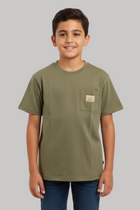 Young boy wearing an olive green t-shirt with a pocket on a white background